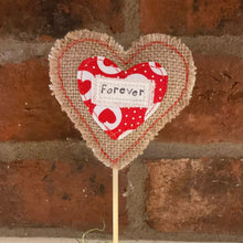 Load image into Gallery viewer, Heart-shaped decorative item with 'Forever' text against a brick wall