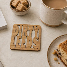 Load image into Gallery viewer, Wooden Laser Cut Coaster - Dirty Leeds / Side Before Self / Champions of Europe / At LeastUntil The World Stops Going Round- Leeds United - Fred & Bo