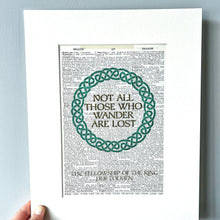 Load image into Gallery viewer, Print with 'Not all those who wander are lost' quote on a gray background