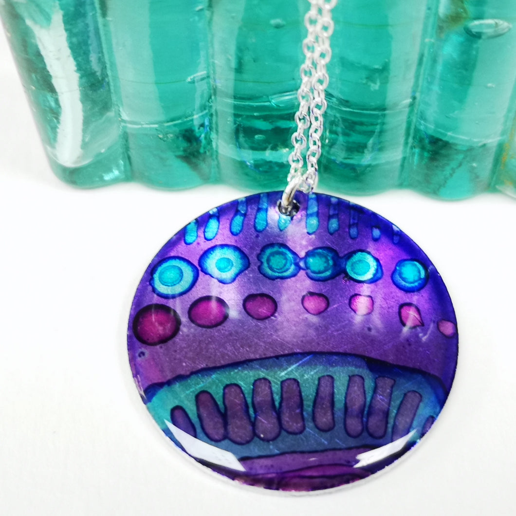 Inky Circular Pendant - Jester - Alcohol Ink & Resin Jewellery - Nimanoma