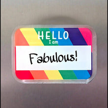 Load image into Gallery viewer, Colorful name tag with 'HELLO I am Fabulous!' text on a metallic surface
