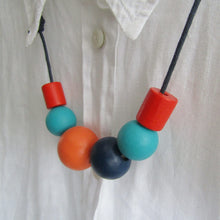 Load image into Gallery viewer, Wooden Bead Necklace - Hand Painted Geometric Bead Necklace - Blues / Reds/ Orange - Induere
