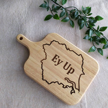 Load image into Gallery viewer, Wooden cutting board with 'Ey Up' engraving on a light background
