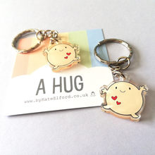 Load image into Gallery viewer, Acrylic Keyring - A Hug - Cute mini hug key ring - By Kate Elford
