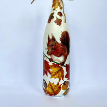 Load image into Gallery viewer, Decoupaged Bottle - Red Squirrel and Autumn Leaves Design - The Upcycled Shop
