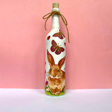 Load image into Gallery viewer, Decoupaged Bottle - Bunny Rabbit and Butterflies Design - The Upcycled Shop
