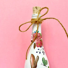 Load image into Gallery viewer, Decoupaged Bottle - Hare and Pink Flowers Design - The Upcycled Shop
