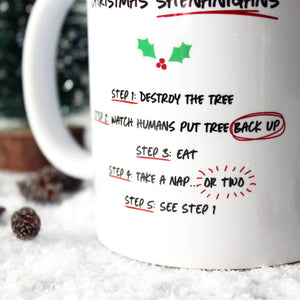 A Cat's Guide to Christmas Shenanigans Mug - Purple Tree Designs